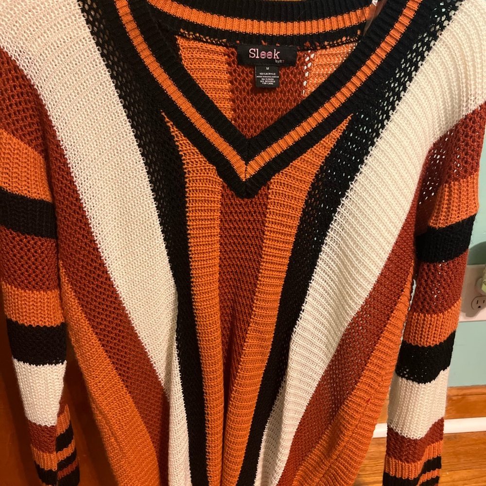 Sold on Mercari - Sleek Striped Knit Sweater
